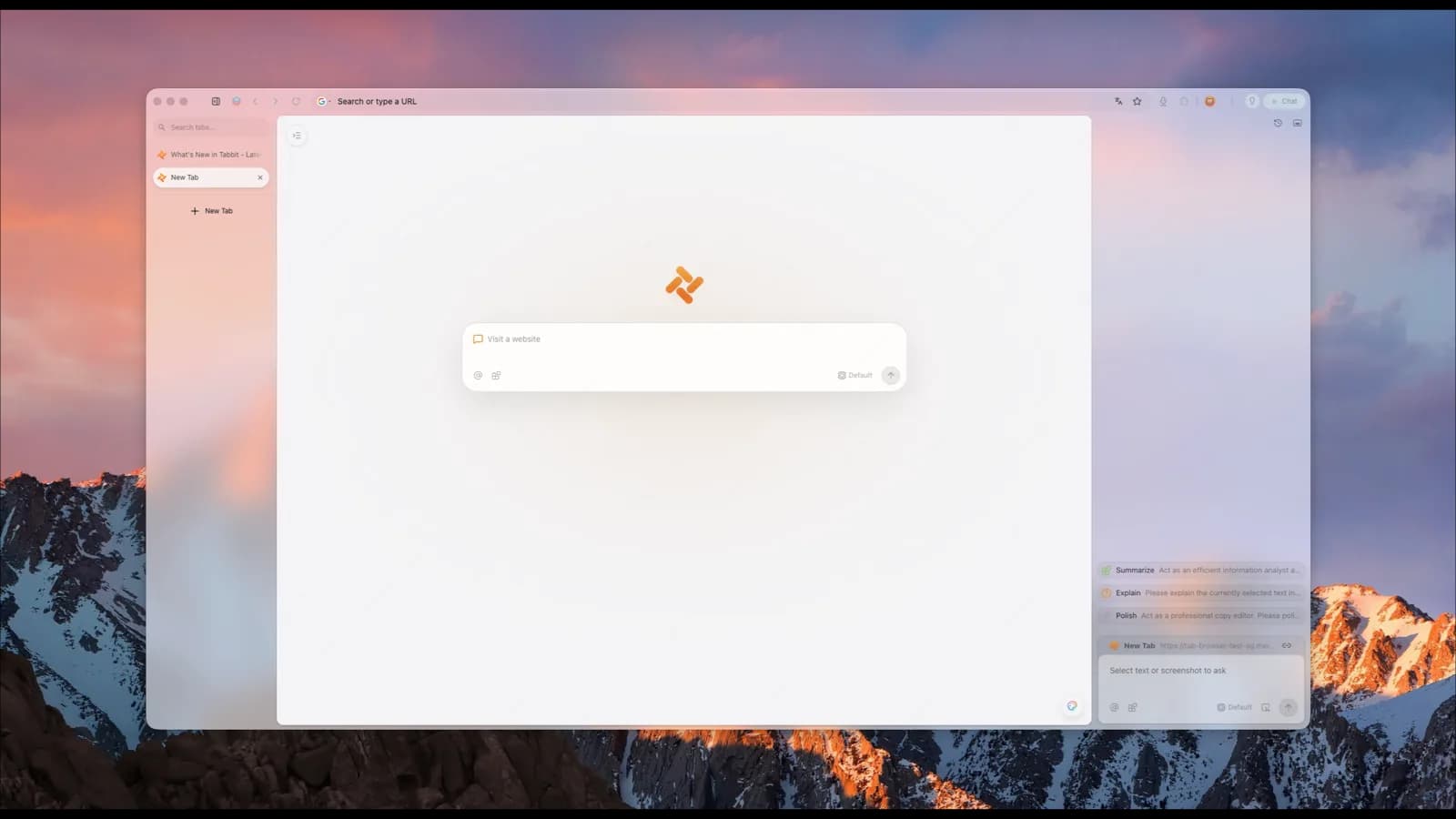 Tabbit Browser new tab page with an AI prompt box displayed on a desktop monitor